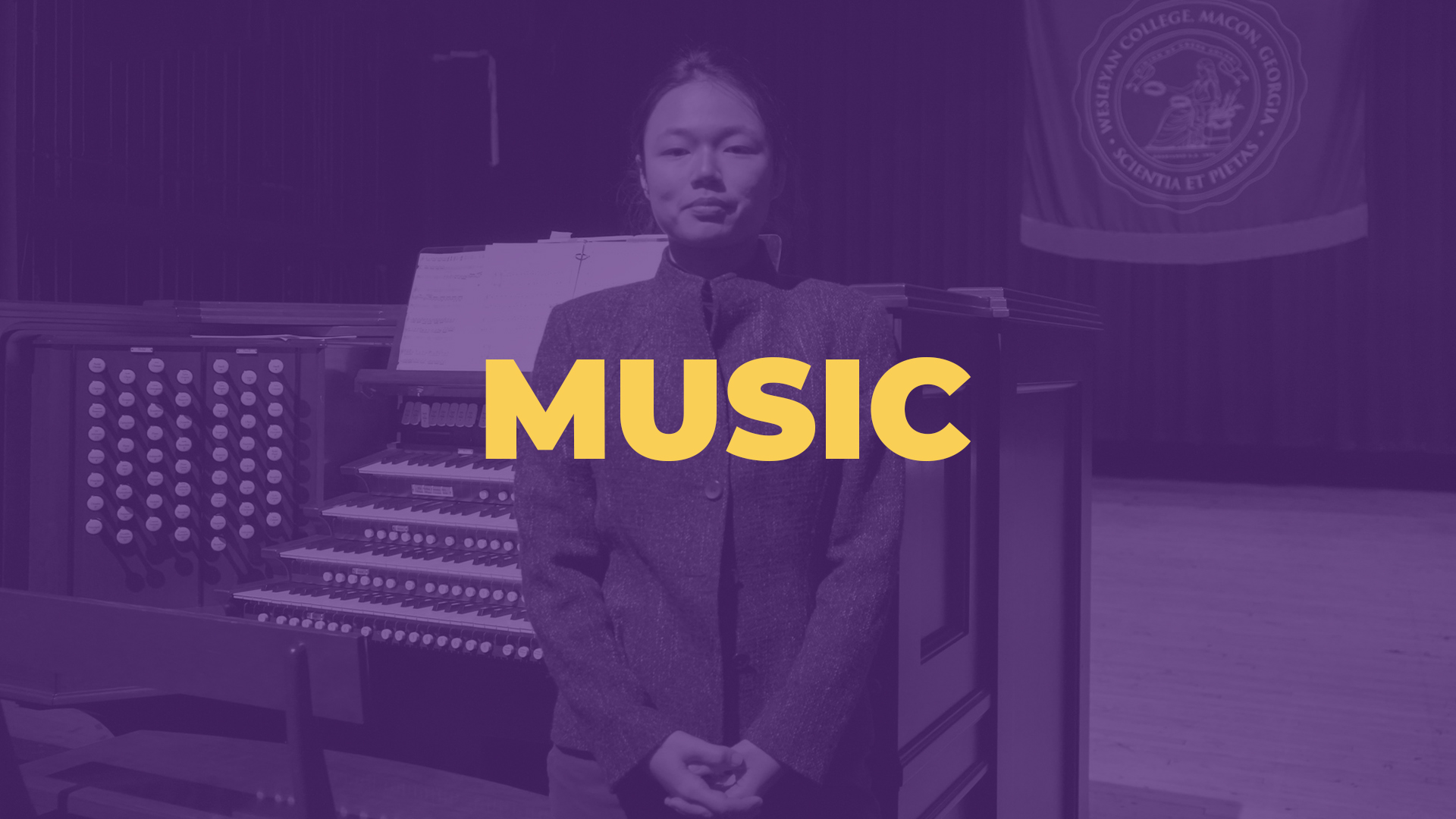 Student in front of Organ